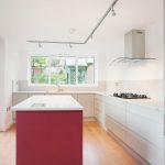 a kitchen with a sink and a window