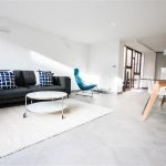 a living room with a wooden floor