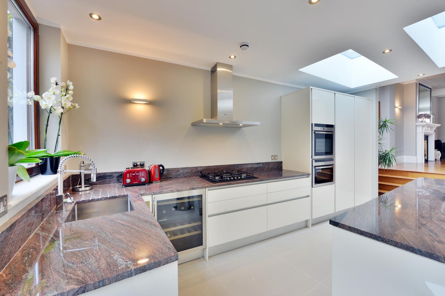 a modern kitchen with stainless steel appliances