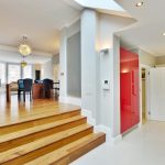 a large empty room with a wooden floor