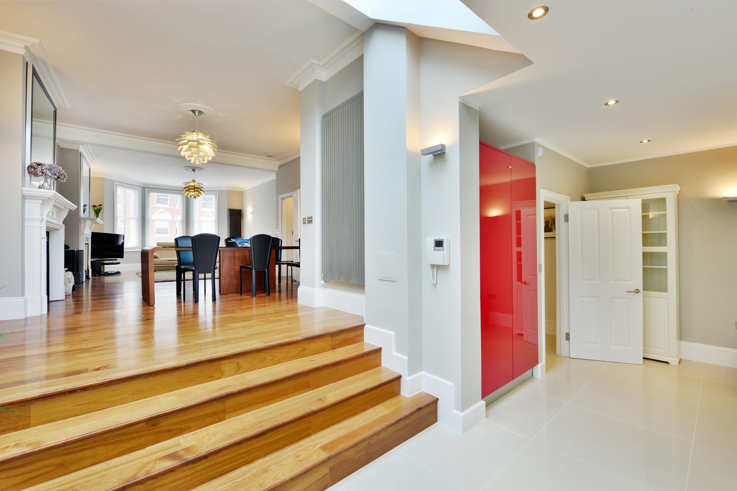 a large empty room with a wooden floor