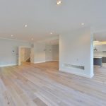 a kitchen with a wood floor