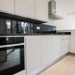 a kitchen with stainless steel appliances