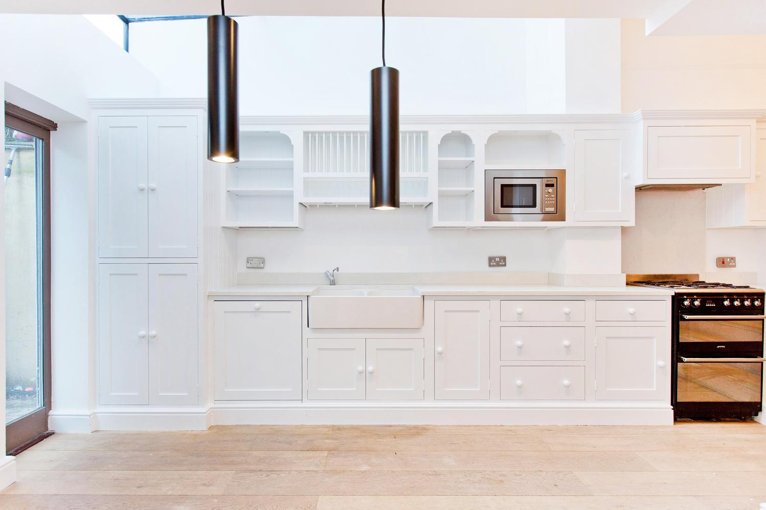 a kitchen with wooden cabinets