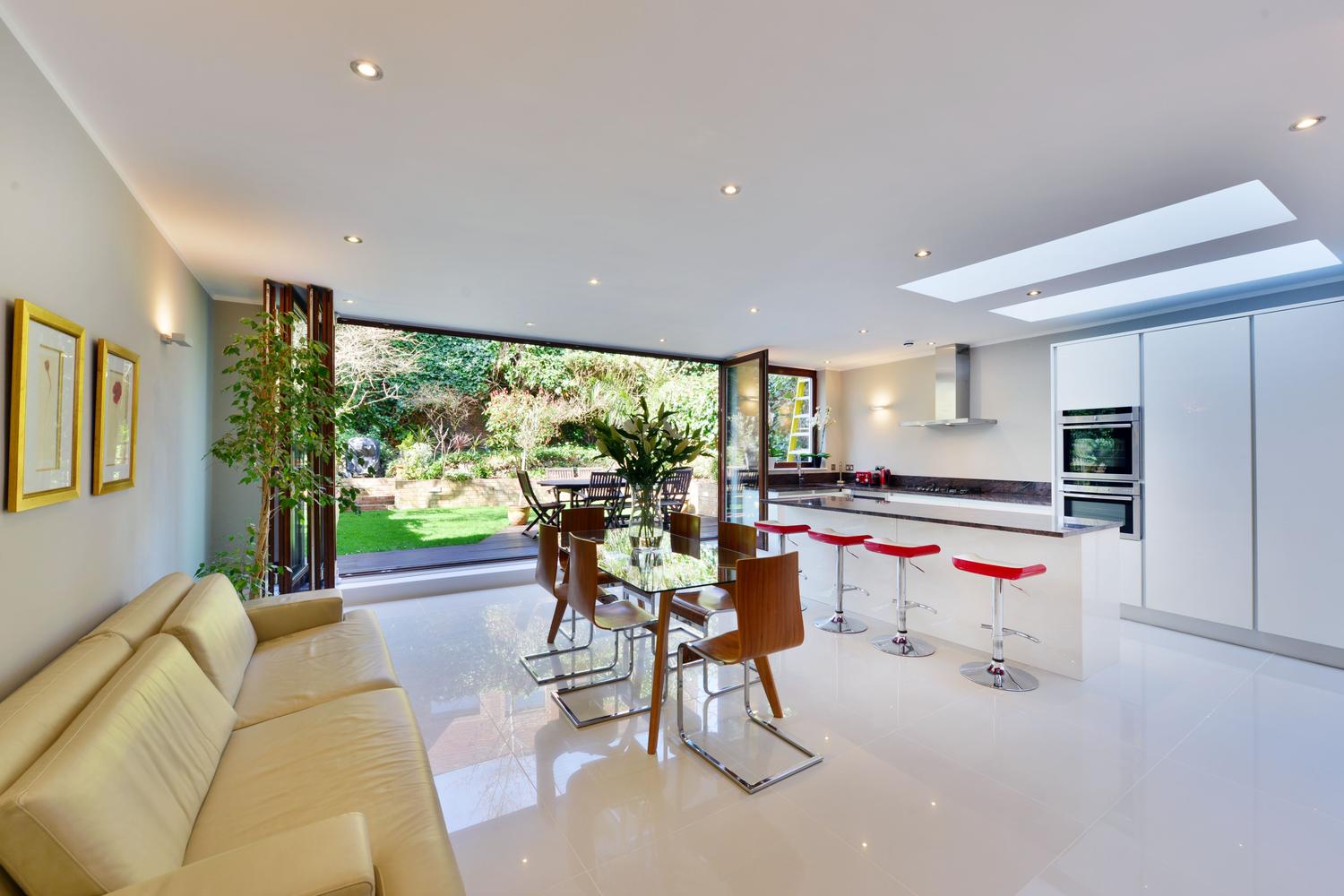 a living room filled with furniture and a fireplace