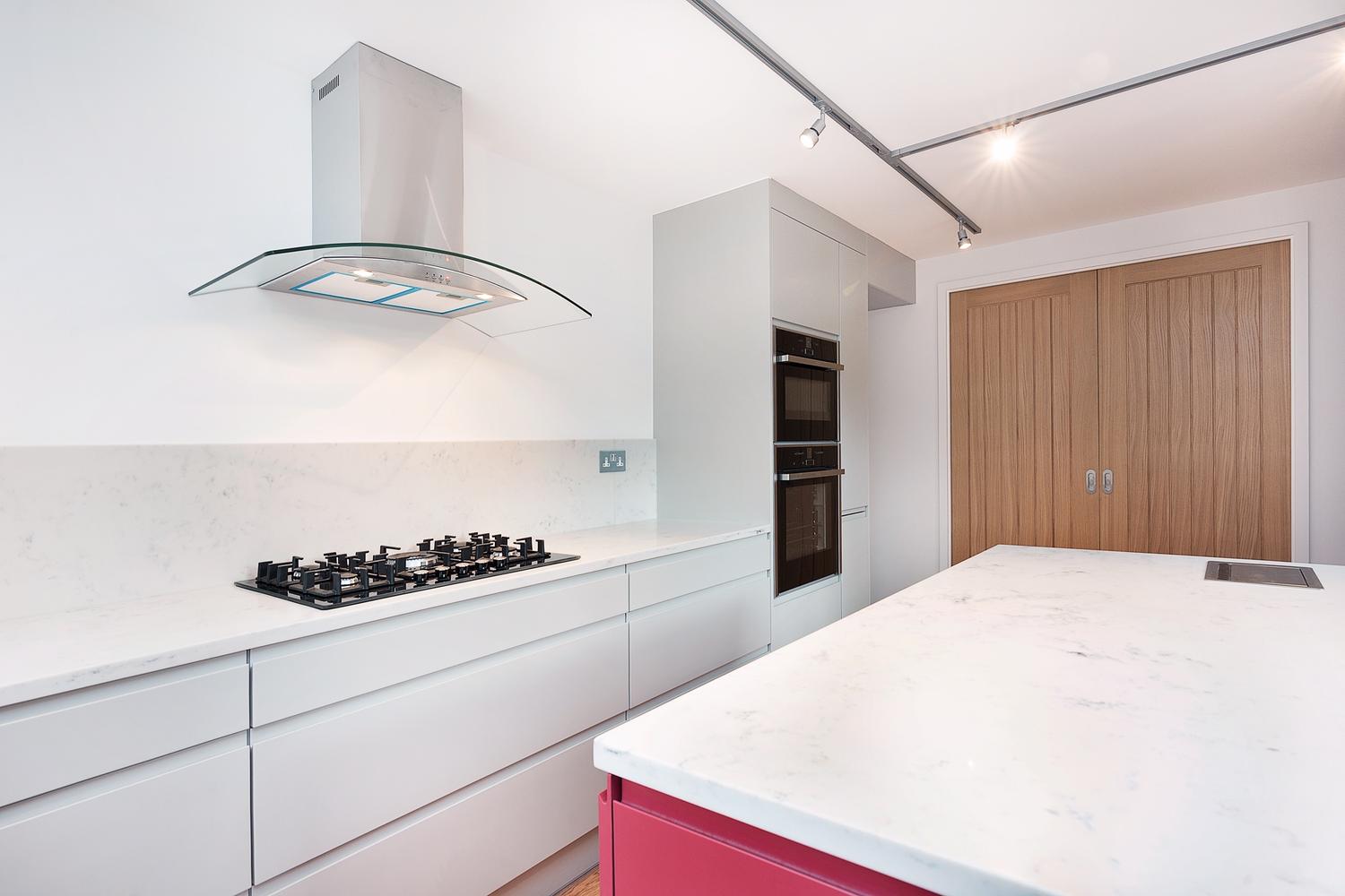 Kitchen design with an extractor hood