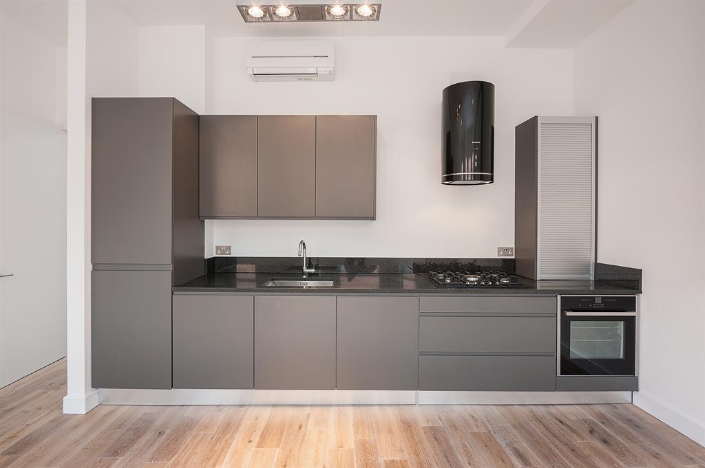 Handleless grey kitchen design