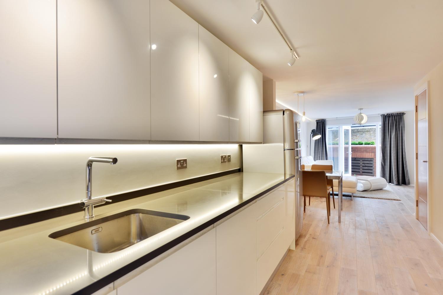 handleless white kitchen design