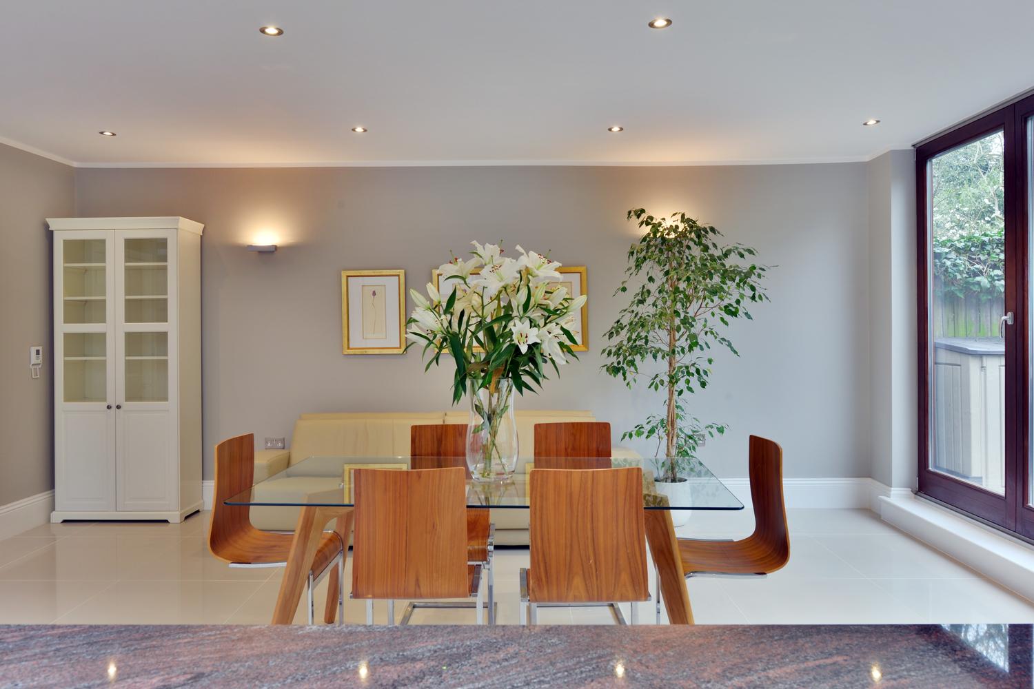 Fancy dining table with wood chairs