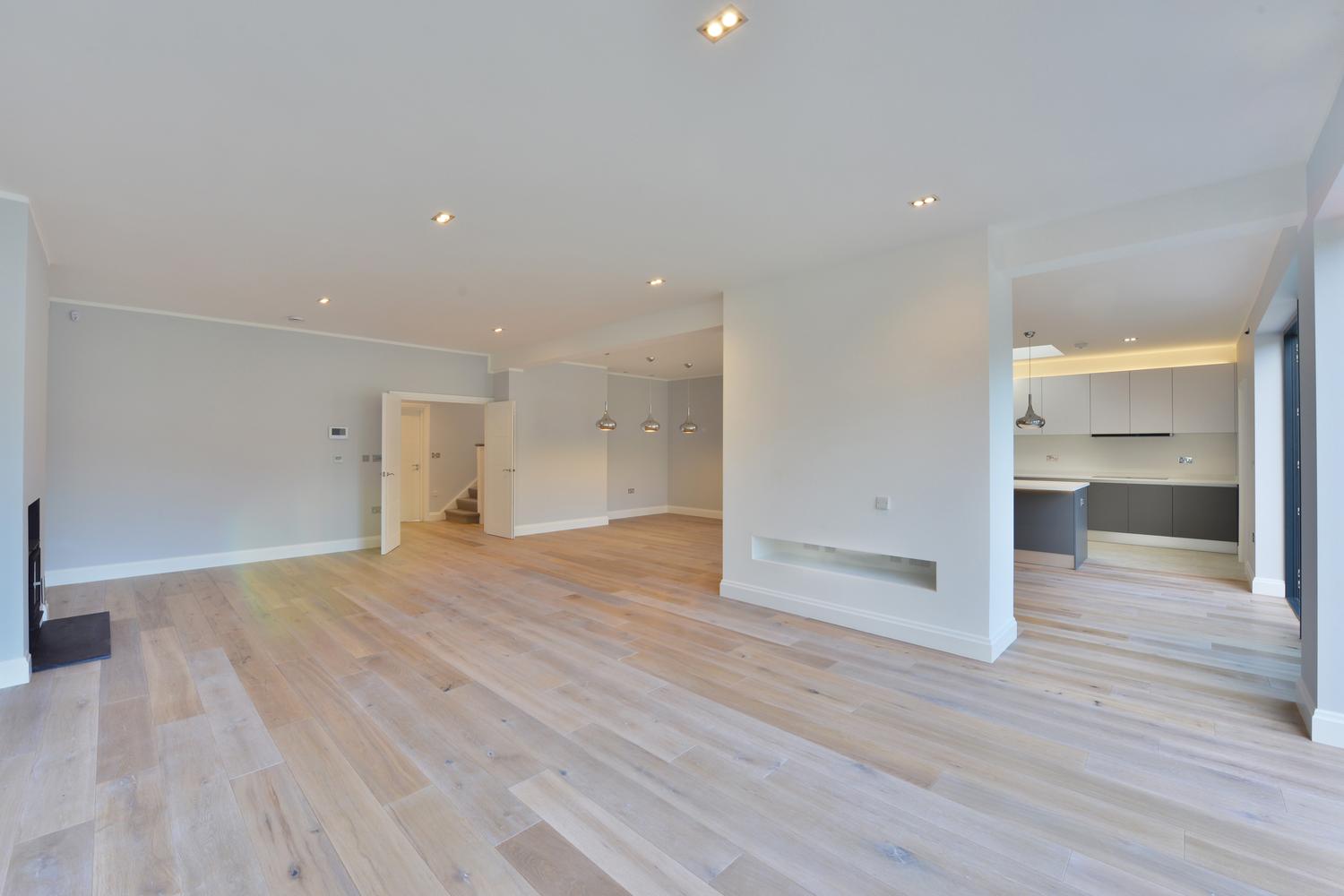 a kitchen with a wood floor