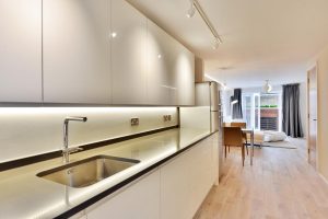 a kitchen with a wood floor