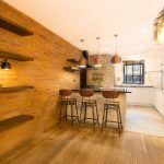 a kitchen with a table in a room