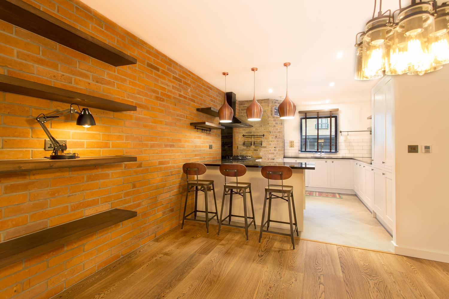 a kitchen with a table in a room