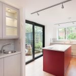 a kitchen with a sink and a window