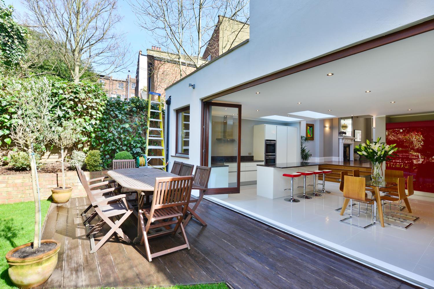 a dining room table in front of a building