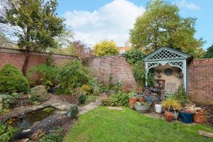 a garden in front of a house